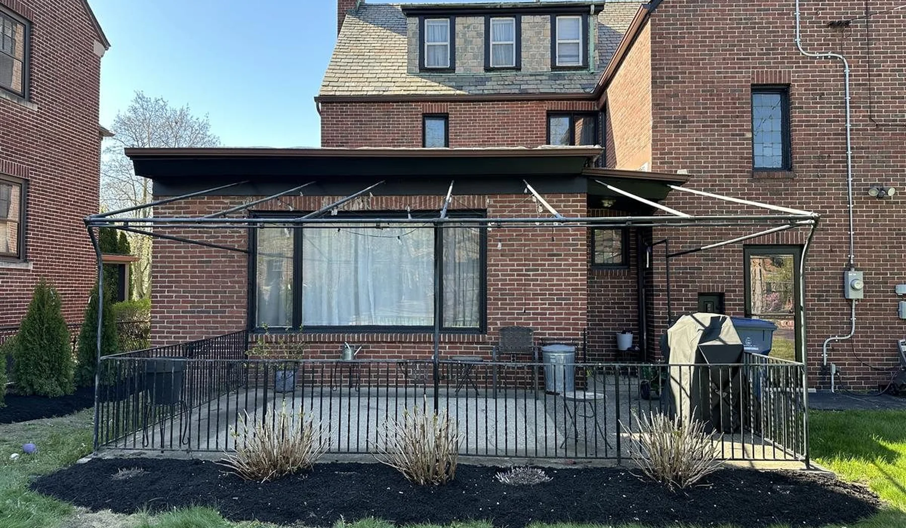 Completed residential landscaping and garden bed installation in Buffalo, New York
